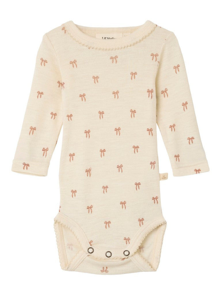 Lil Atelier | Romper Nalu wol strikjes
