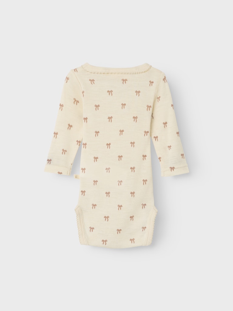 Lil Atelier | Romper Nalu wol strikjes